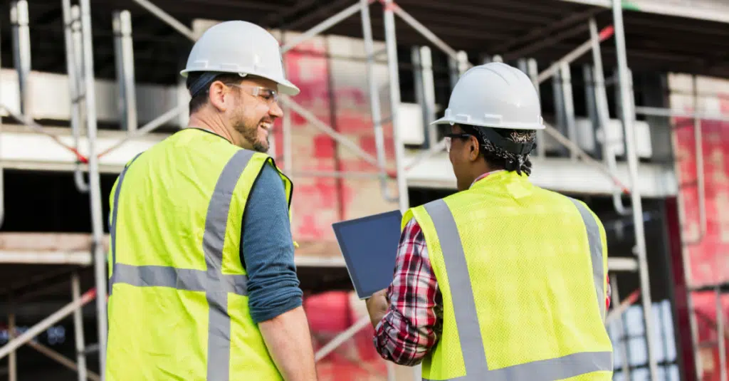 Image of two construction crew workers for a blog about 8 technology trends.